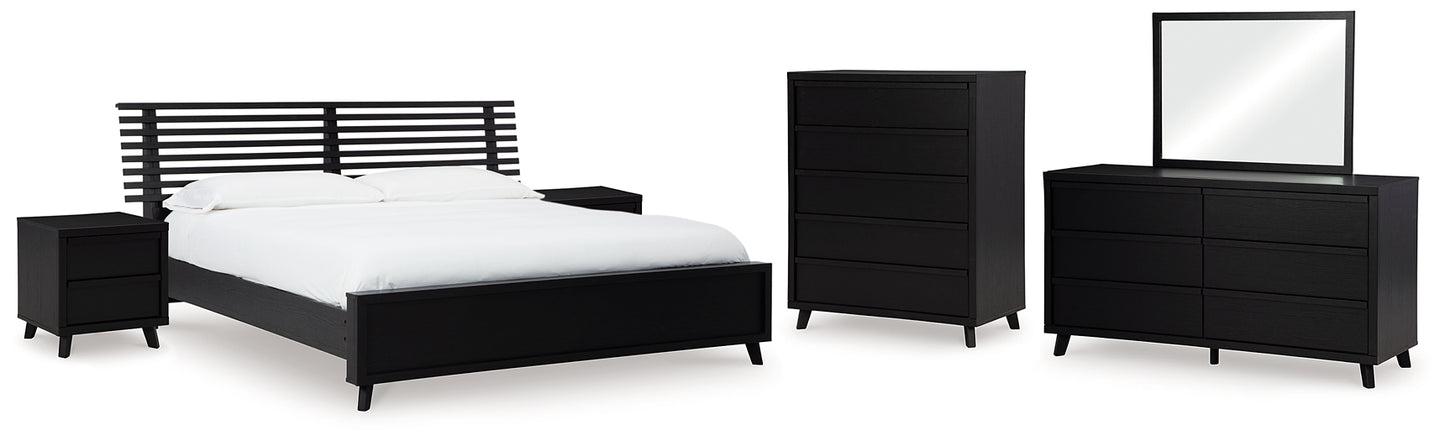 Danziar Queen Panel Bed with Mirrored Dresser, Chest and 2 Nightstands