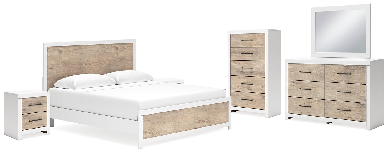 Cama King Charbitt con tocador con espejo, cómoda y dos mesitas de noche