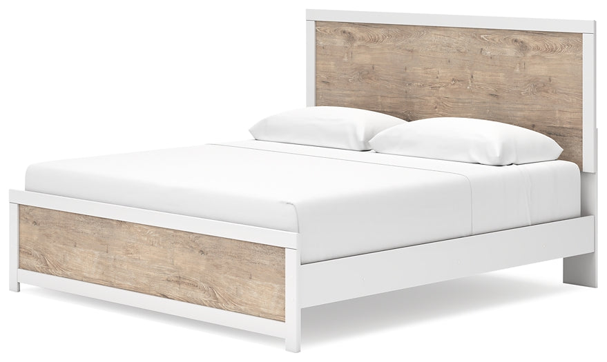 Cama King Charbitt con tocador con espejo, cómoda y dos mesitas de noche