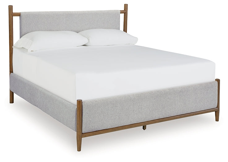 Cama Queen tapizada Lyncott con tocador con espejo y mesita de noche