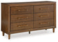 Lyncott Queen Upholstered Bed with Dresser and 2 Nightstands