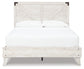 Cama Queen Shawburn con plataforma y dos mesitas de noche