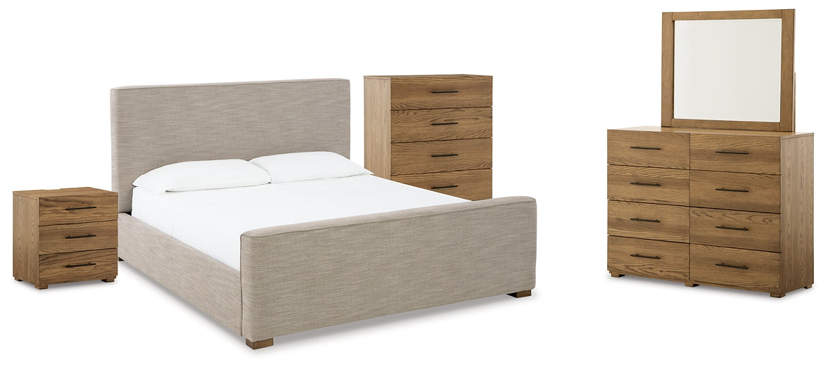 Cama Queen tapizada Dakmore con tocador con espejo, cómoda y mesita de noche