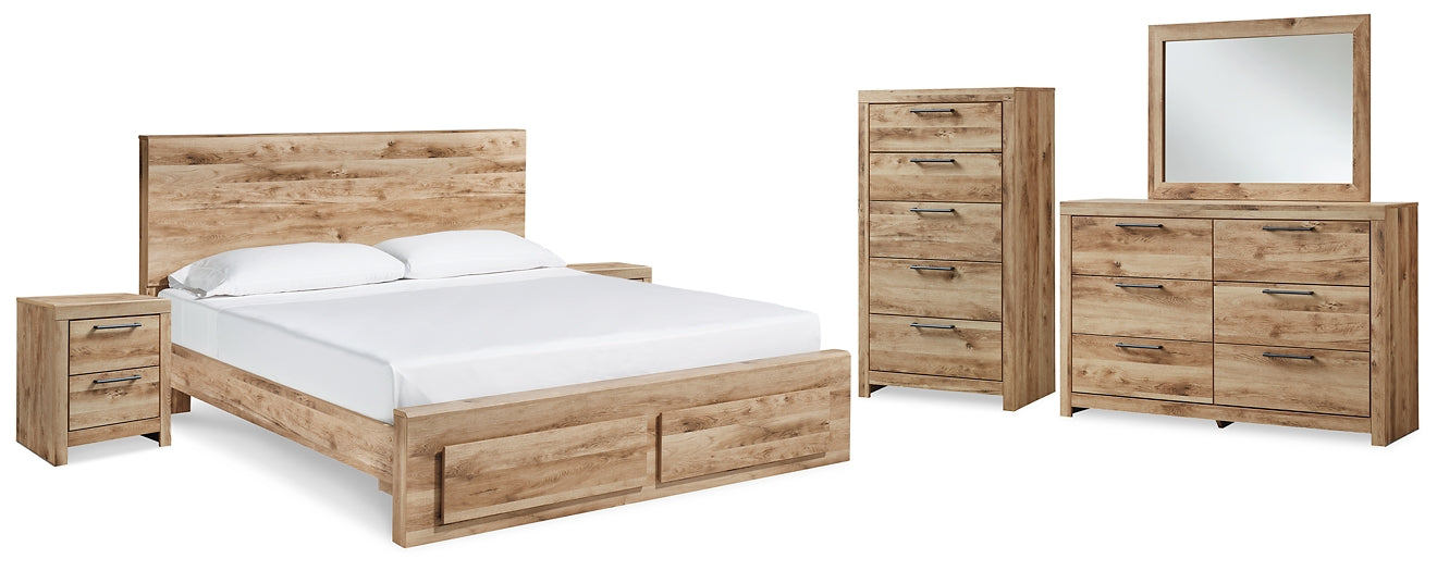 Cama Queen Hyanna con paneles de almacenamiento, tocador con espejo, arcón y dos mesitas de noche