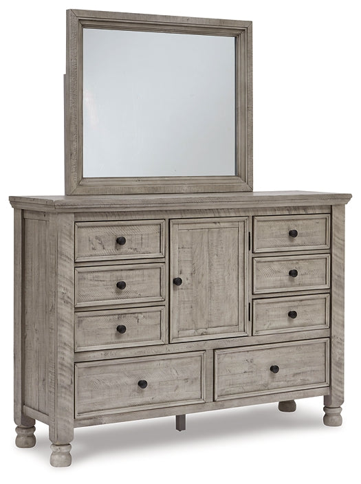 Harrastone King Panel Bed with Mirrored Dresser and Chest